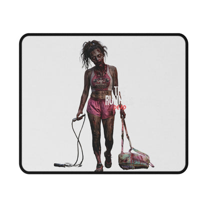 A rectangular mouse pad with a black border and a printed graphic of a zombie runner wearing pink athletic wear, holding a jump rope and a duffel bag, on a light gray background.