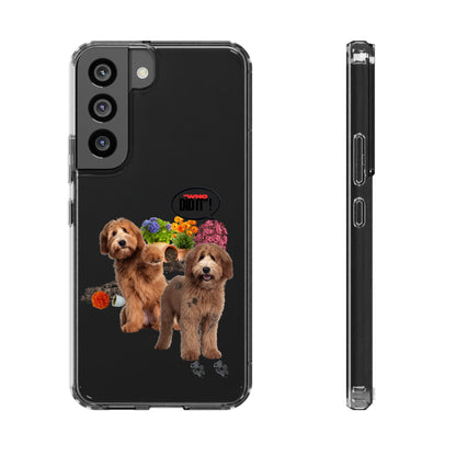 A clear protective phone case shown from two angles: a back view on the left and a side profile view on the right. The back of the case is black and features a graphic print of two brown wire-haired dogs (resembling golden doodogs) with colorful flowers and a small red digital clock in the center.