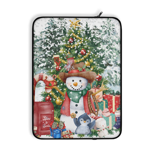 A laptop sleeve featuring a festive Christmas illustration with snowmen, a decorated tree, snow, and wrapped gifts, shown on a plain white background.