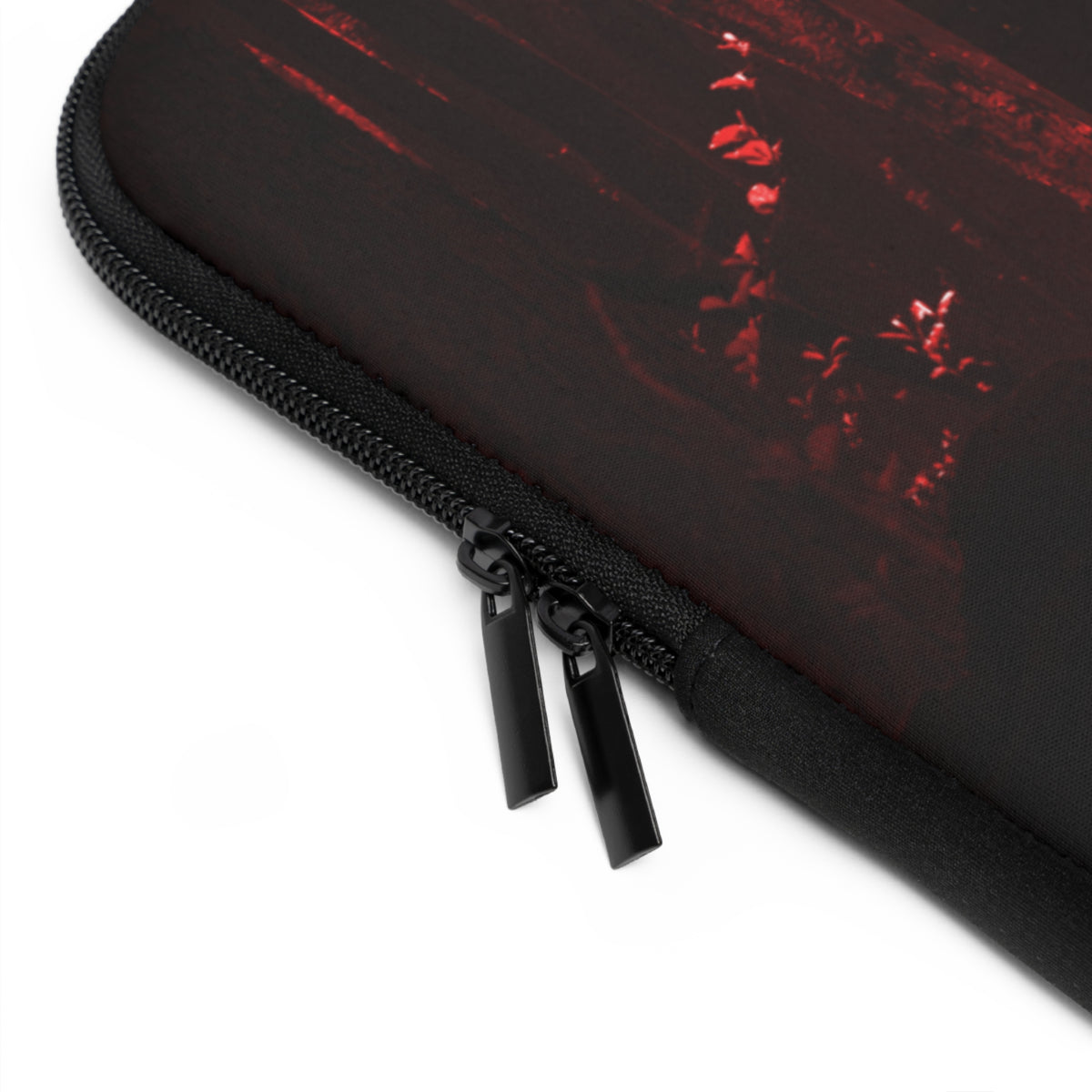 Black zipper on a black sleeve against a white background