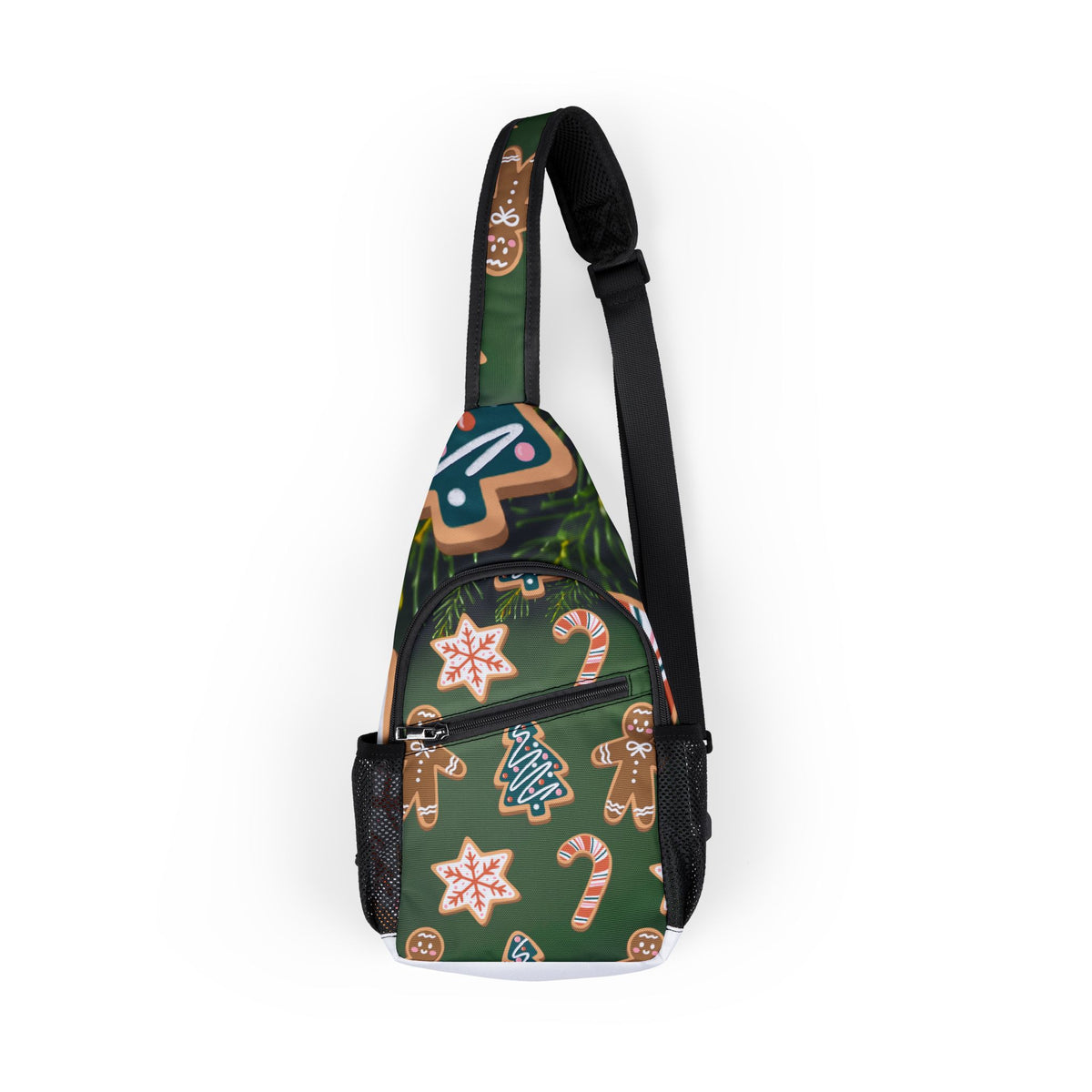 A single-strap sling backpack with a dark green background featuring a festive gingerbread cookie and candy cane pattern, shown on a plain white background.