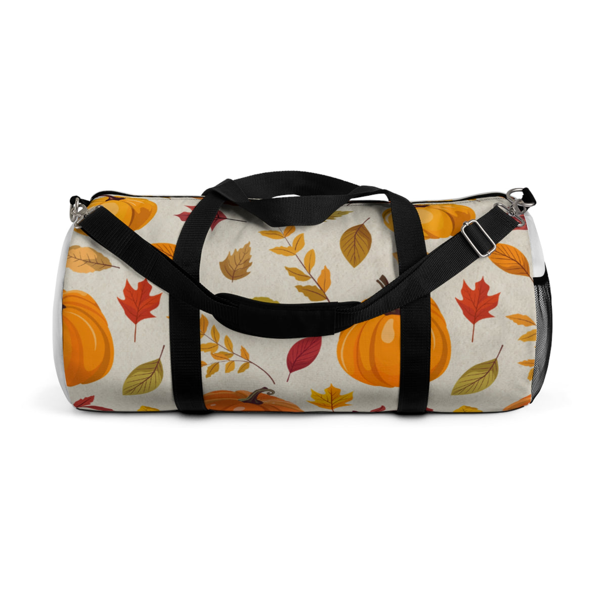 A cylindrical duffel bag with a black handle and shoulder strap, featuring an autumn pattern of orange pumpkins and colorful leaves on a cream background.