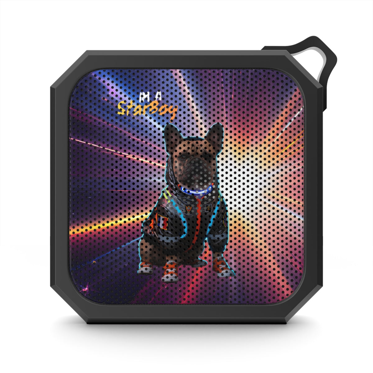 A square black speaker with rounded corners and a hanging loop, featuring a colorful printed graphic of a French bulldog in a hoodie against a neon light burst background. The speaker grille is visible, and the brand text 'MADE IN USA' appears in the upper left of the print.