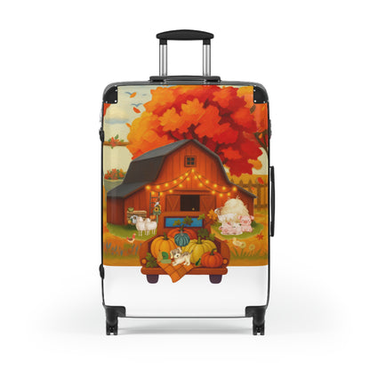 A hardshell suitcase with an extended telescopic handle and spinner wheels, featuring a detailed autumn farm illustration on the exterior. The design includes a red barn, a large orange and red autumn tree, pumpkins, sheep, and a white horse in a field, set against a clean white background.