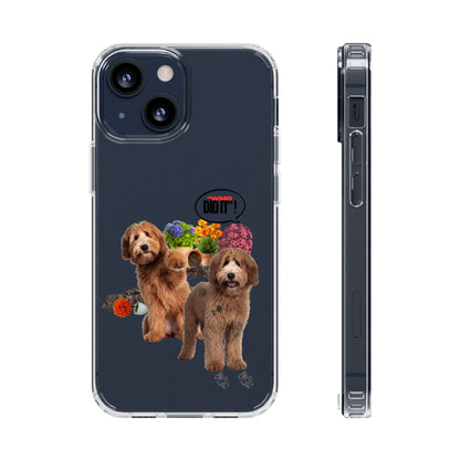 Clear Phone Case – Wasn’t Me featuring two fluffy brown dogs surrounded by spilled soil, overturned flowerpots and colorful flowers, with muddy paw prints and a “Who Did It?” speech bubble.