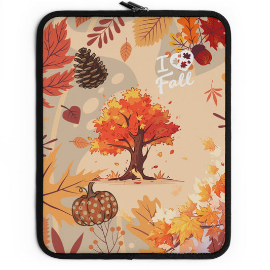 A laptop sleeve featuring an autumn-themed illustration with a tree, pumpkins, pinecone, and scattered fall leaves on a beige background. The words 'I Love Fall' are printed on the left side.