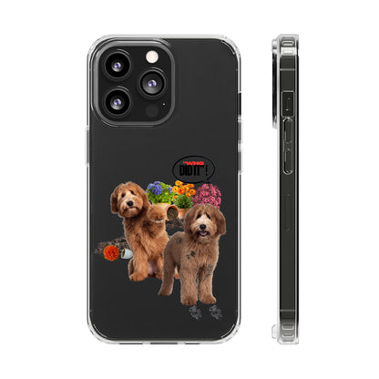 Clear Phone Case – Wasn’t Me featuring two fluffy brown dogs surrounded by spilled soil, overturned flowerpots and colorful flowers, with muddy paw prints and a “Who Did It?” speech bubble.