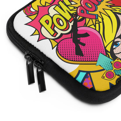 A close-up of a zippered protective case featuring a vibrant pop-art comic book style graphic with a pink heart, yellow and black rifle silhouette, and bold comic-style text on a white background.