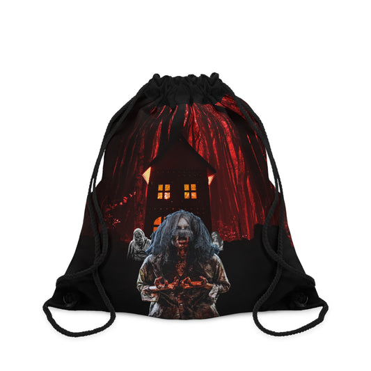 A black drawstring bag featuring a horror-themed graphic print of a zombie holding a bloody knife in front of a haunted house under a red sky.