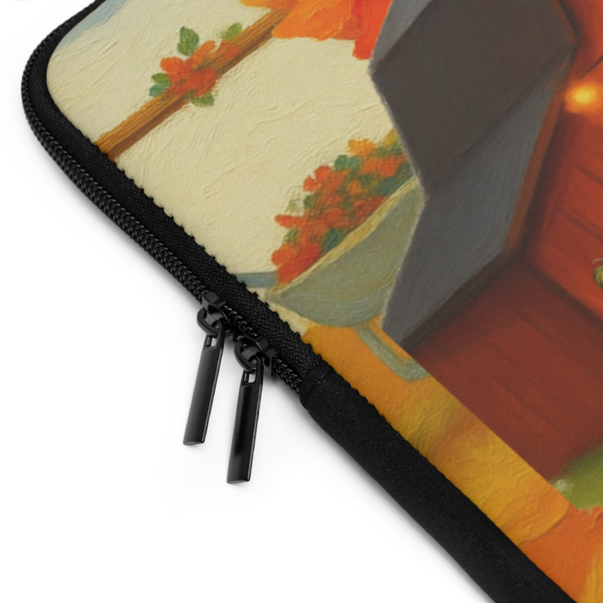 Close-up of a zippered sleeve or case with a black zipper and dual zipper pulls, featuring a textured painting-style print in warm tones of orange, red, yellow, and gray on a white background.