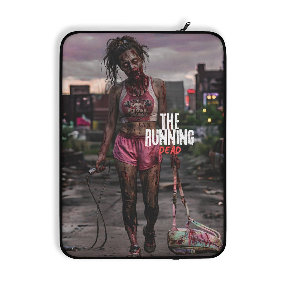 A laptop sleeve featuring a graphic print of the WORDS 'The Running Dead' with a zombie character and the title text, shown on a plain white background.