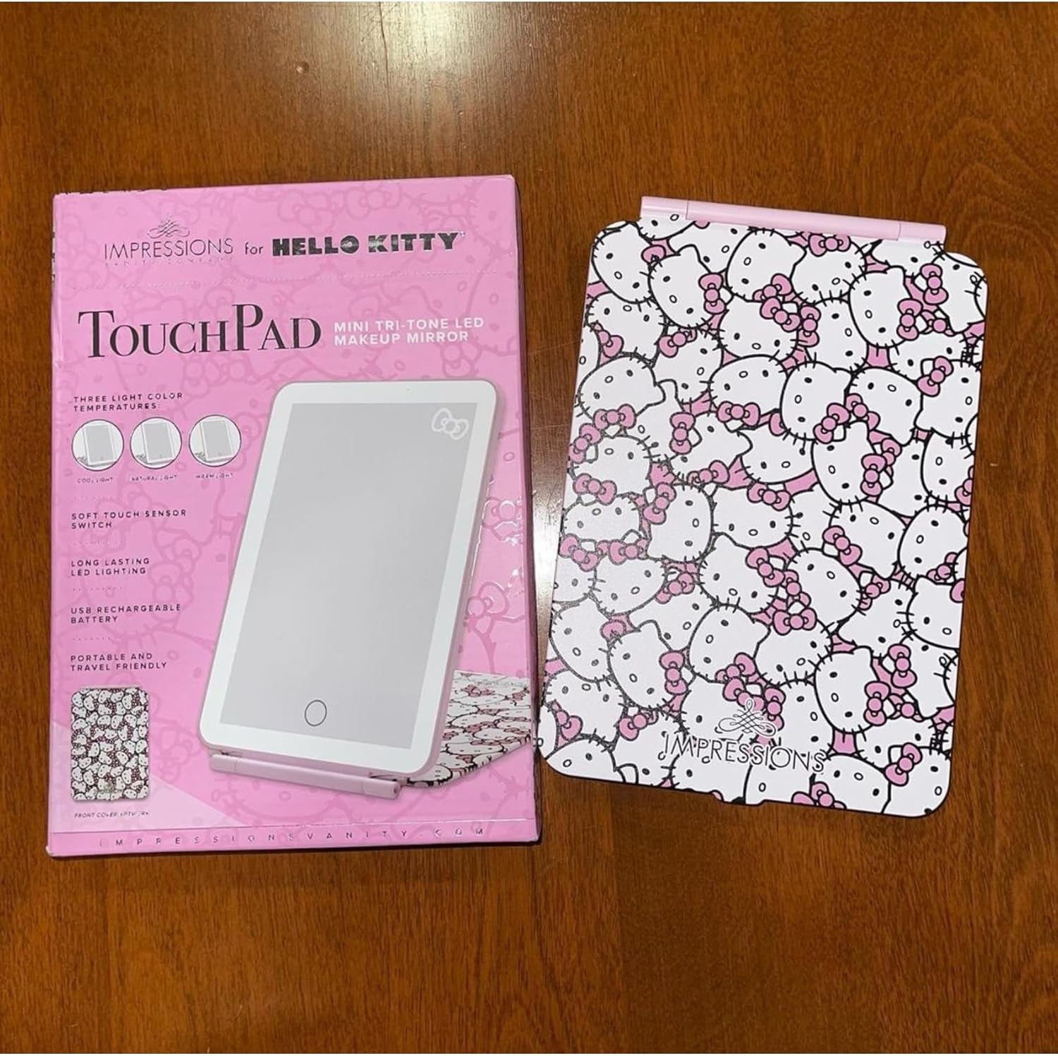 Impressions Vanity Hello Kitty Touch Pad Mini Tri-Tone Makeup Mirror with Printed Flip Cover and LED Strip, Travel Vanity Mirror with Touch Sensor Switch and USB Extension (White/Pink)