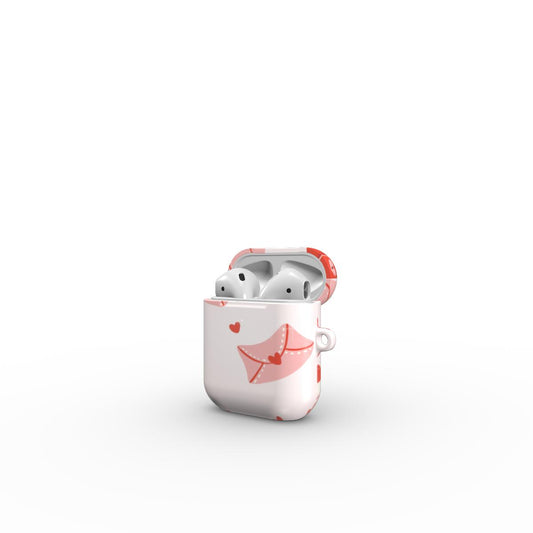 A white AirPods case with pink envelopes and heart graphics, shown open with white AirPods inside on a clean white background.