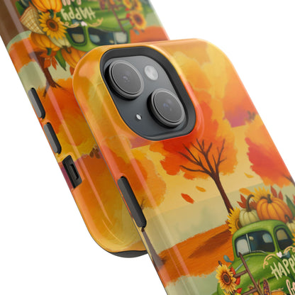 A close-up of a phone case featuring a colorful autumn harvest illustration with orange and yellow leaves, sunflowers, pumpkins, and a green pickup truck on a white background.