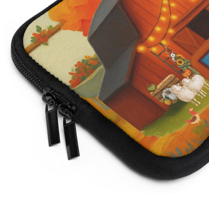 Close-up of a zippered fabric case with a colorful illustrated design showing a barn, sheep, pumpkins, flowers, and autumn foliage. The case has a black zipper and black zipper pulls, photographed on a white background.