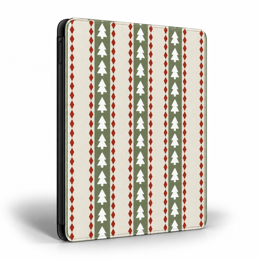 A tablet case featuring a festive holiday pattern of vertical stripes with white Christmas trees on olive green, red diamonds, and a cream background.