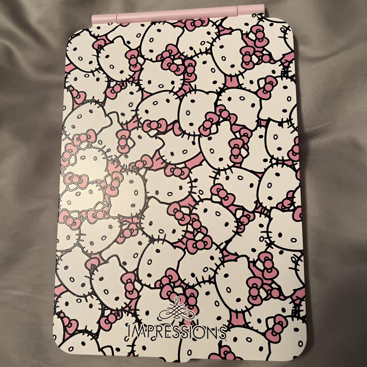 Impressions Vanity Hello Kitty Touch Pad Mini Tri-Tone Makeup Mirror with Printed Flip Cover and LED Strip, Travel Vanity Mirror with Touch Sensor Switch and USB Extension (White/Pink)