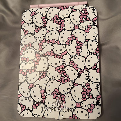 Impressions Vanity Hello Kitty Touch Pad Mini Tri-Tone Makeup Mirror with Printed Flip Cover and LED Strip, Travel Vanity Mirror with Touch Sensor Switch and USB Extension (White/Pink)